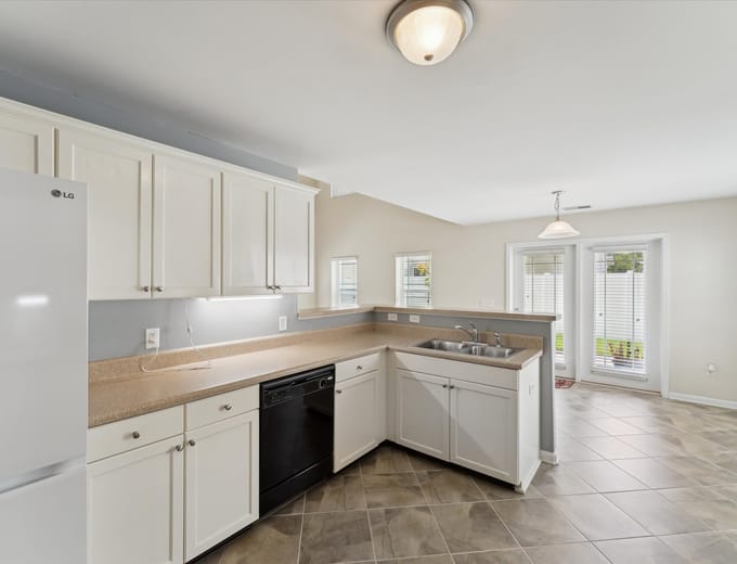 Bright kitchen with island inside a Richmond Hill, GA home
